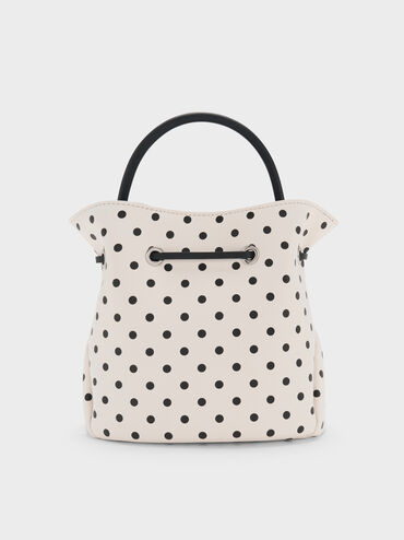 حقيبة باكيت هازل بفيونكة ونقشة منقطة, كريمي, hi-res