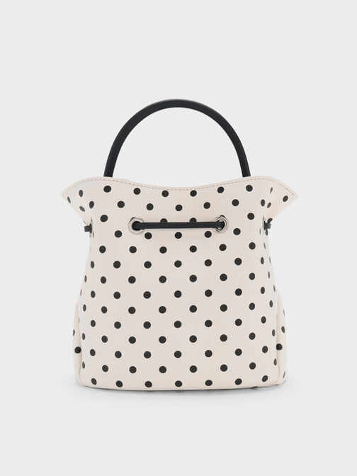 حقيبة باكيت هازل بفيونكة ونقشة منقطة, كريمي, hi-res