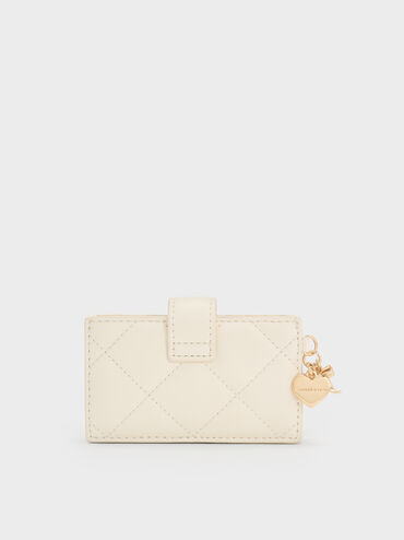 حافظة بطاقات "آرييتي" مبطنة بتطريز ومزود بقطعة جمالية على شكل قلب وفيونكة بحزام لإغلاقها, كريمي, hi-res