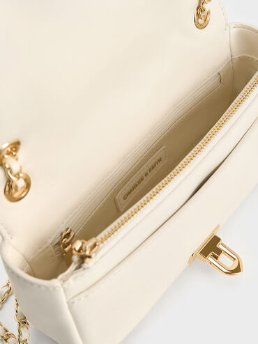 حقيبة كتف أروين بتصميم ماسي فاخر وحمالة أنيقة مضفّرة, كريمي, hi-res